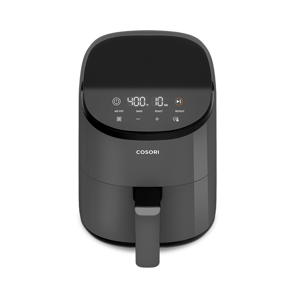 High-angle view of the dark grey Cosori Mini Air Fryer showing its small countertop footprint