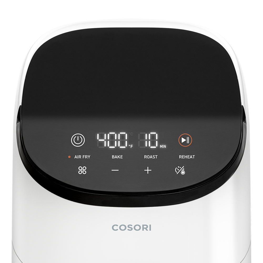 Close-up of the user-friendly digital interface on the white Cosori Lite 2.1-Qt Air Fryer.