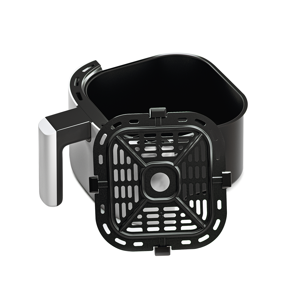 White Cosori Mini Air Fryer basket pulled out to reveal the dishwasher-safe nonstick interior.